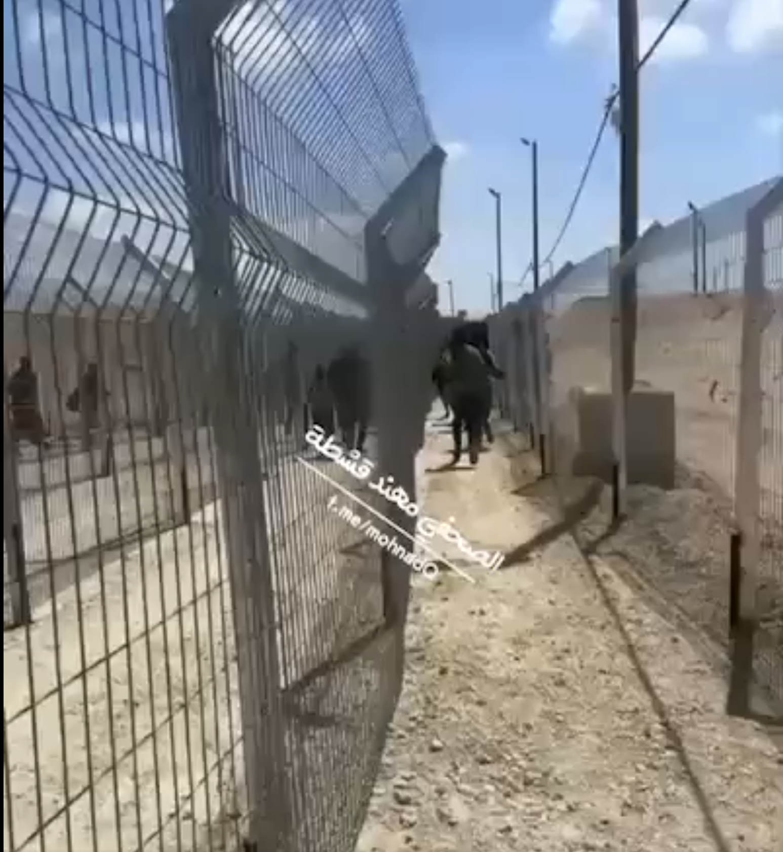 Image for the event titled: Fenced-off aid distribution corridor