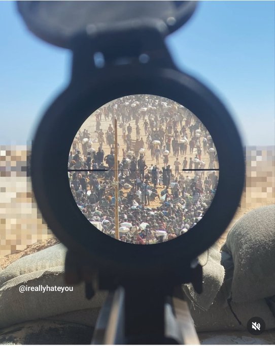 Image for the event titled: August 13: IDF soldier points his sniper rifle at aid seekers