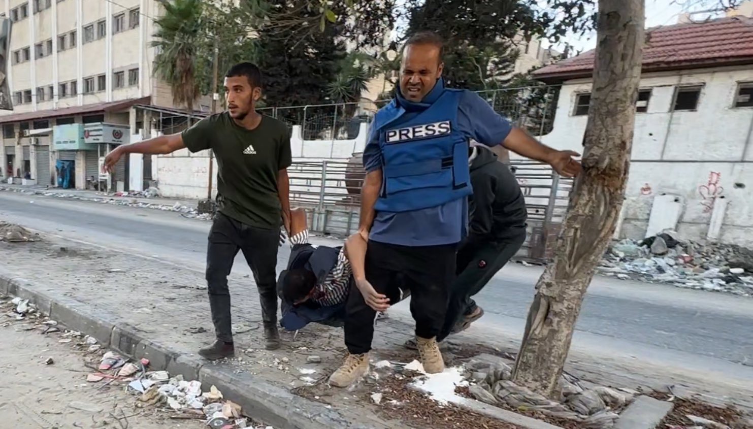 Image for the event titled: Islam Badr and civilians pull Fadi's body to safety