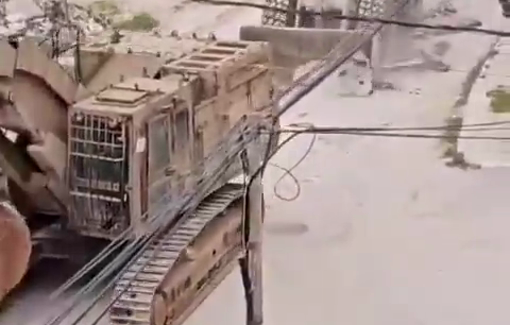 Thumbnail preview image for the video titled: The Israeli occupation bulldozers destroy streets and infrastructure in Jenin.