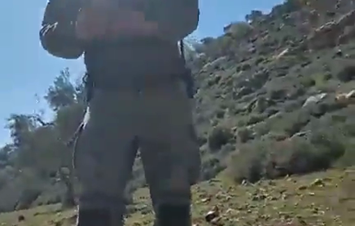 Thumbnail preview image for the video titled: In Khirbet al-Marajim, a soldier is threatening activist Rabbi Arik Asherman before detaining him.