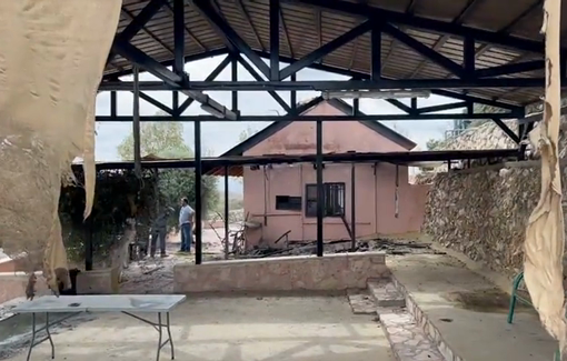 Thumbnail preview image for the video titled: A Palestinian farm in the village of Deir Dibwan was set on fire and olive trees cut down by settlers