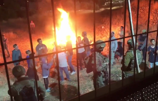 Thumbnail preview image for the video titled: Israeli settlers attacked Issa Amro house, throwing stones and setting fire to our land while chanting death threats