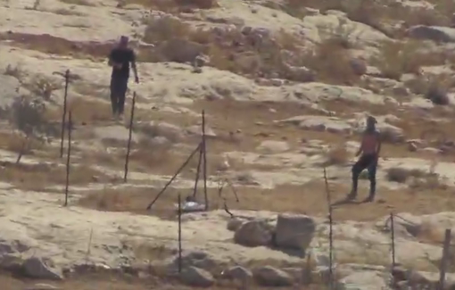 Thumbnail preview image for the video titled: In Sh'ib al-Butum, dozens of settlers pelted residents' homes with stones, broke into the houses, destroyed property, and attacked an elderly woman with clubs