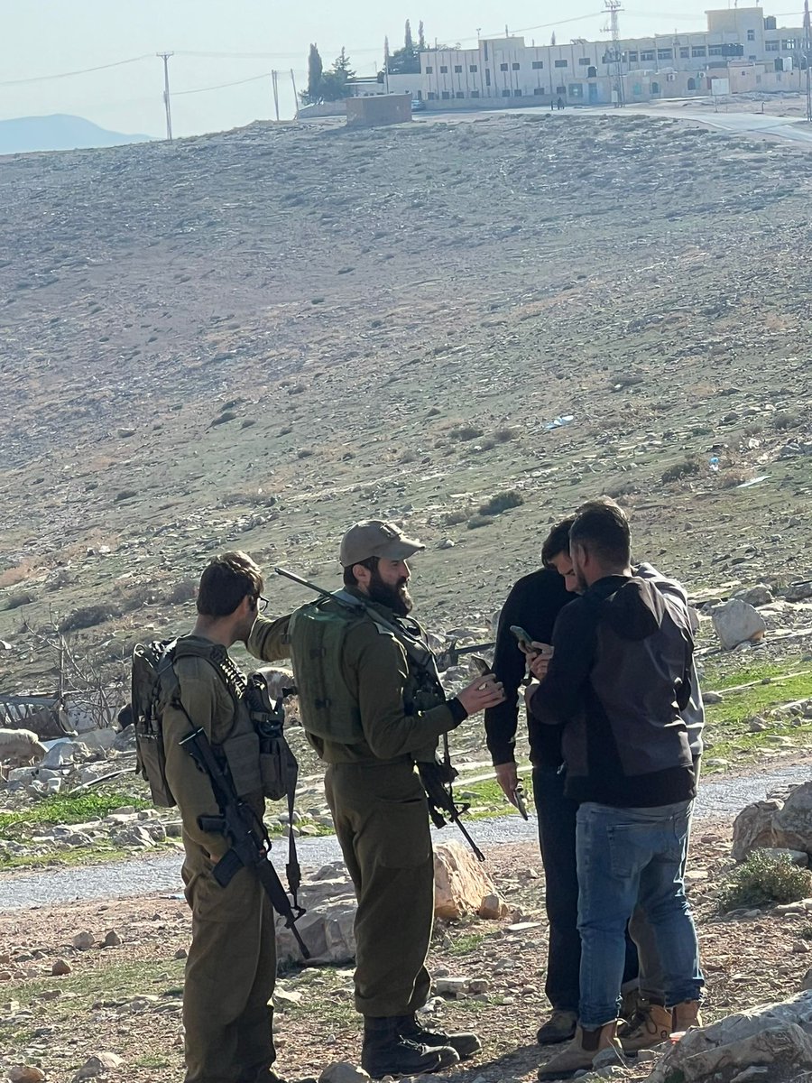 Thumbnail preview image for the video titled: Shimon Atiya and Yinon Levi invading Umm al Khait land under the protection of the soldiers