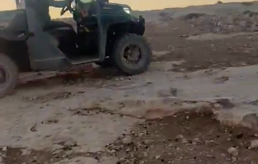 Thumbnail preview image for the video titled: In Tuba, a settler evicts a flock of the village residents’ sheep while riding toward them on an ATV