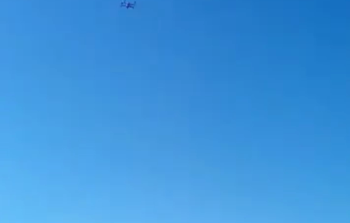 Thumbnail preview image for the video titled: An Israeli drone was spotted hovering over Palestinian farmers while grazing their sheep east of Al-Shuyukh in the occupied West Bank city of Hebron.