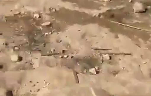 Thumbnail preview image for the video titled: An Israeli settler chases residents and tries to run over a Palestinian woman after storming Shab Al-Batam area in Masafer Yatta,