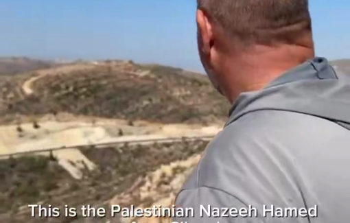 Thumbnail preview image for the video titled: Settlers harvesting his olive trees backed by Israeli forces in Silwad