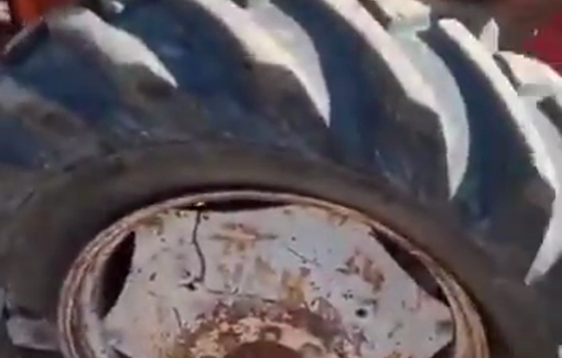Thumbnail preview image for the video titled: Israeli settler mobs vandalized a tractor and assaulted its driver in the village of Susya
