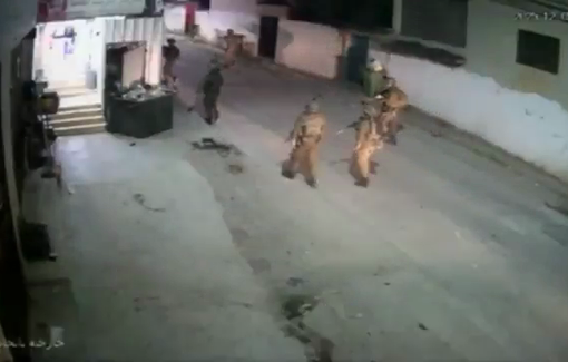 Thumbnail preview image for the video titled: Israeli soldiers fire a tear-gas canister inside a commercial store in Madama