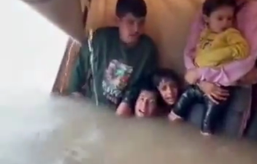 Thumbnail preview image for the video titled: Families literally underwater in the fragile tents of besieged Gaza