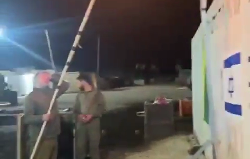 Thumbnail preview image for the video titled: Fighters of the 13th Battalion of the Golani Brigade light the third Hanukkah candle in Rafah