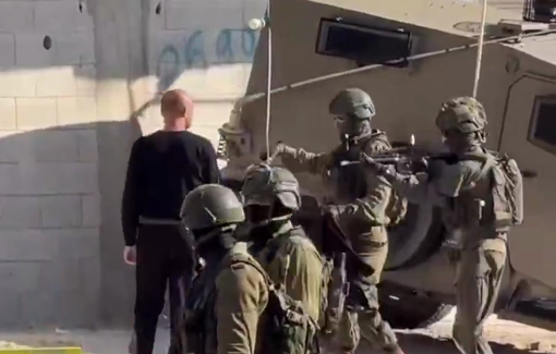 Thumbnail preview image for the video titled: Israeli soldiers inspect the Palestinians before letting them enter the Nur Shams refugee camp in order to evacuate their homes