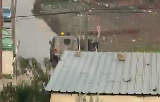 Thumbnail preview image for the video titled: Israeli forces fire live ammunition and tear gas canisters during a raid on the town of Beit Furik
