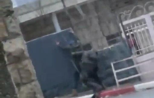 Thumbnail preview image for the video titled: Israeli forces assault a young man during their raid on the village of Kafr Malik