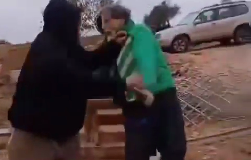 Thumbnail preview image for the video titled: Israeli settler assaults a human rights activist in the village of Duma