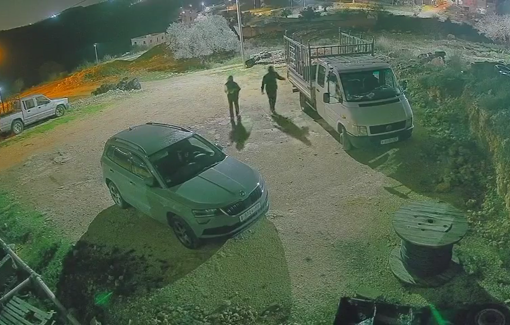 Thumbnail preview image for the video titled: In Birzeit, Israeli settlers returned to the area where they had injured a woman, set two cars on fire, and sprayed hateful graffiti