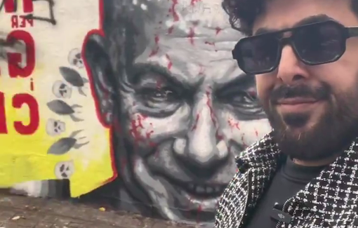 Thumbnail preview image for the video titled: Israeli graffiti propagandist Dudi Shoval painting over an anti-genocide mural in Barcelona