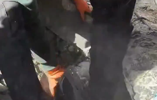 Thumbnail preview image for the video titled: Palestinian civil defense teams use their hands to rescue killed and wounded from the rubble of Sheikh Radwan's Police stattion