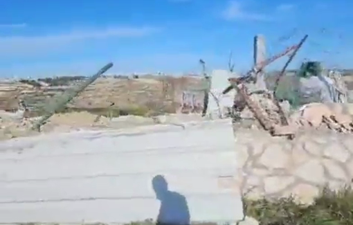 Thumbnail preview image for the video titled: Israeli bulldozers demolish a Palestinian agricultural room and plow land in the Zeif area, south of Hebron