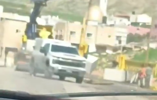 Thumbnail preview image for the video titled: Israeli forces place a metal barrier at the entrance to the village of Ein Shibli, northeast of Nablus