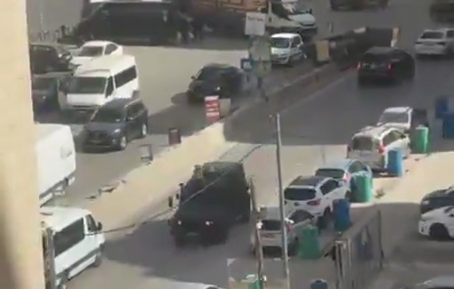 Thumbnail preview image for the video titled: Israeli military jeeps are chasing children and scaring them as they leave their schools during an army raid on Kafr Aqab