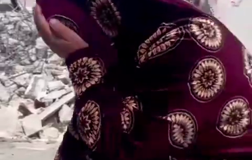 Thumbnail preview image for the video titled: A Palestinian woman weeps over the demolition of her son’s home in the village of Beit Awwa, southwest of Hebron