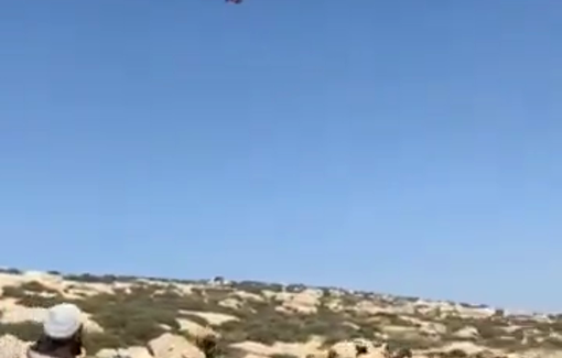 Thumbnail preview image for the video titled: A drone operated by the Mordechai Zacharia outpost chased a flock of sheep away from the grazing land of Kharaba