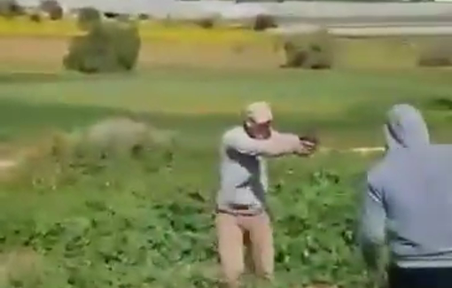 Thumbnail preview image for the video titled: Armed Jewish settlers terrorize Palestinian residents of Khirbet al-Himma at gunpoint