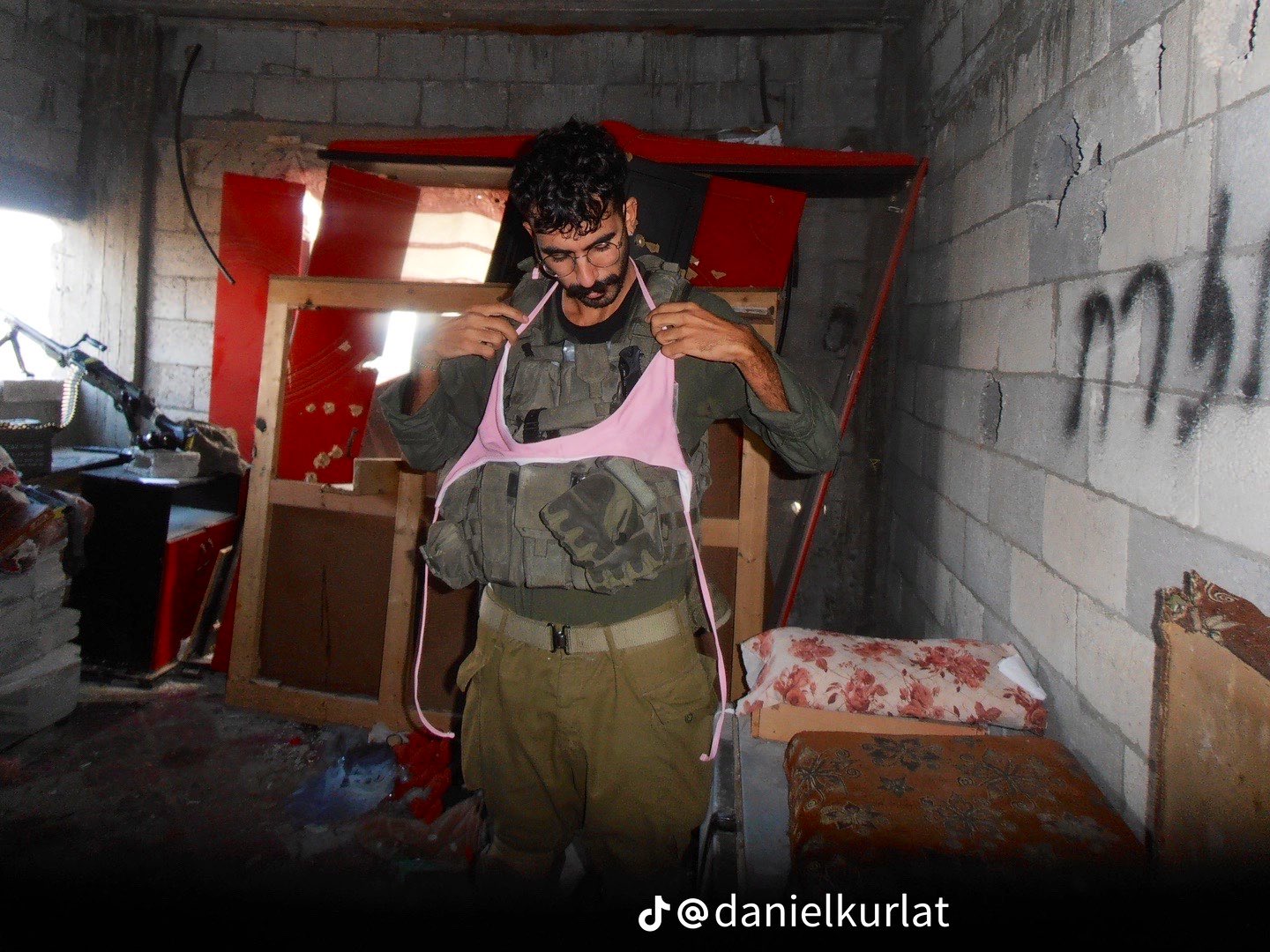 Thumbnail preview image for the video titled: An IDF sniper takes a break by wearing a Palestinian woman’s bra in Beit Hanoun