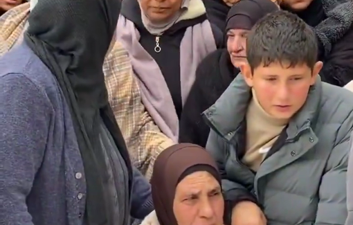 Thumbnail preview image for the video titled: Ali Bani Odeh conforting his grand-mother after the killing of his family by Israeli Special forces