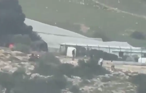 Thumbnail preview image for the video titled: Jewish settlers setting fire on agricultural facilities and vehicles in Safah Tayasir