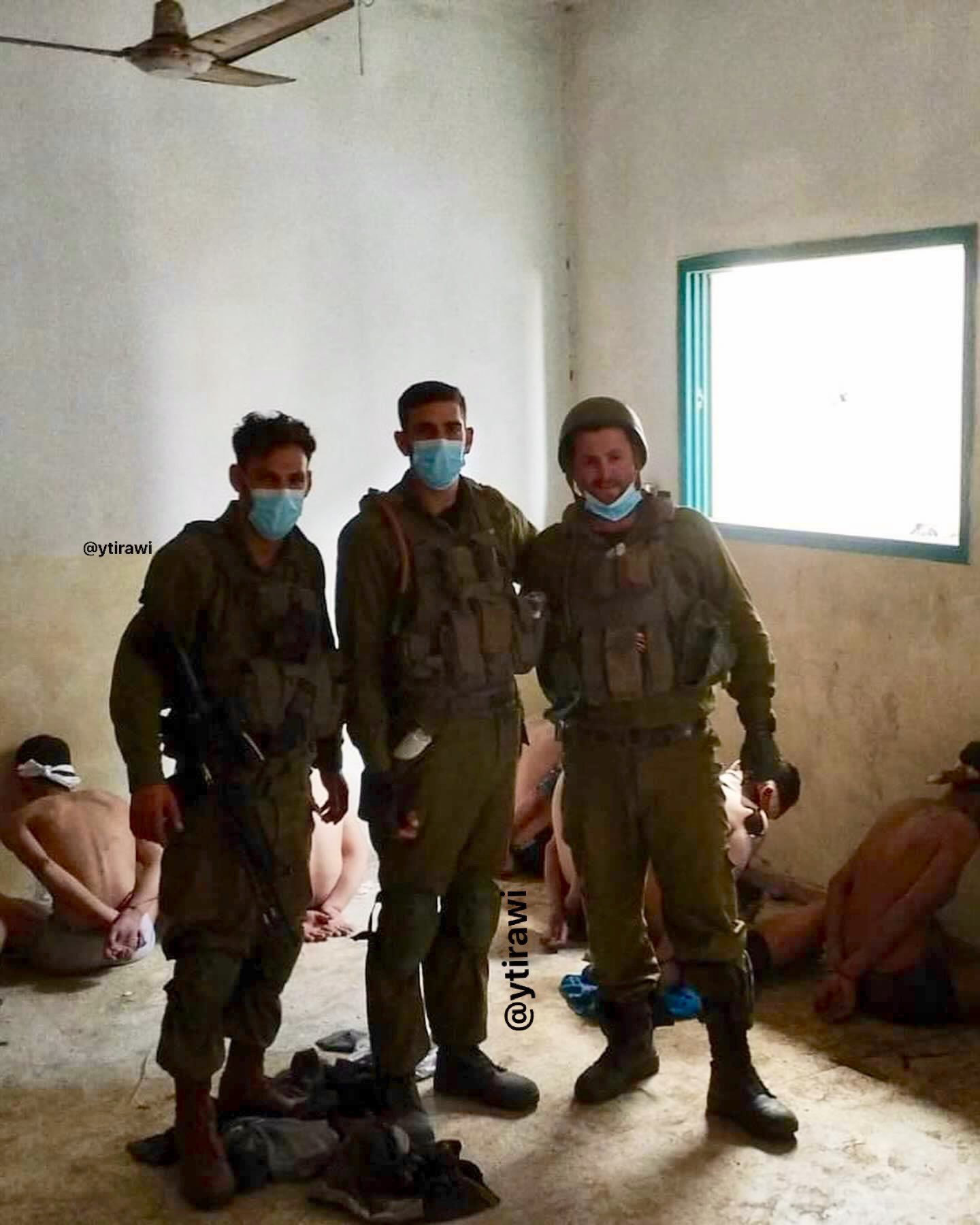 Thumbnail preview image for the video titled: Israeli soldiers from the 7421 battalion of the Kiryati Brigade displaying half-naked kidnapped Palestinians