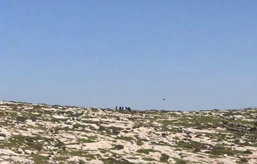 Thumbnail preview image for the video titled: About a dozen settlers from Kol Mevaser outpost and threw rocks upon the Palestinians of the village of Mukhmas