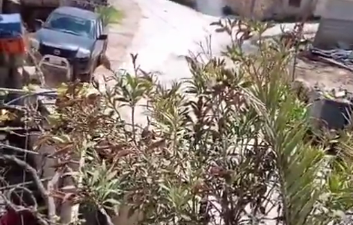 Thumbnail preview image for the video titled: Israeli forces fire tear gas during a raid on Al-Mughayyir