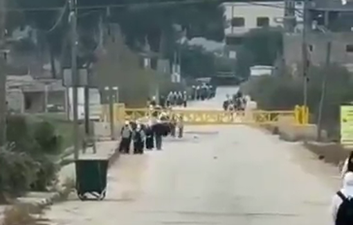 Thumbnail preview image for the video titled: In Lubban al-Sharqiya, south of Nablus, the army closed the gate on the way of school for Palestinian students