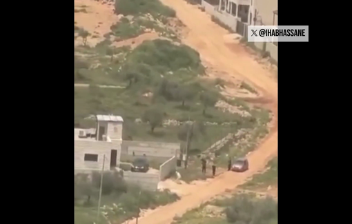 Thumbnail preview image for the video titled: Israeli settlers attacking the village of Ein Sinya, throwing stones at civilian homes while solider injured a Palestinian man.