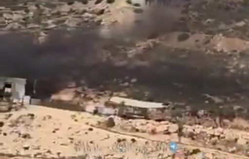 Thumbnail preview image for the video titled: Israeli settlers, under the protection of Israeli soldiers, continue their attack on the village of al-Mughayyir