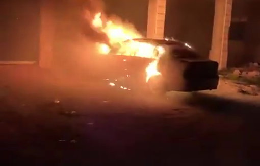 Thumbnail preview image for the video titled: Israeli settlers set fire to a vehicle and threw stones at homes on the outskirts of the town of Turmus Ayya