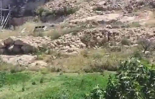 Thumbnail preview image for the video titled: Israeli settlers set fire to a bulldozer and a private vehicle belonging to Palestinian residents in the Wadi al-Rakhim area