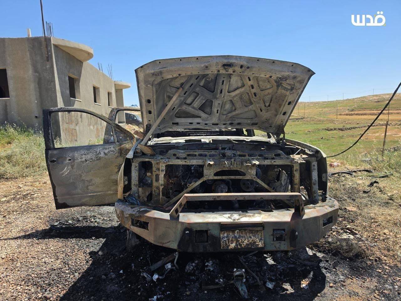 Thumbnail preview image for the video titled: Israeli settler set fire to a Palestinian vehicle and bulldozer in Wadi al-Rakhim, Masafer Yatta