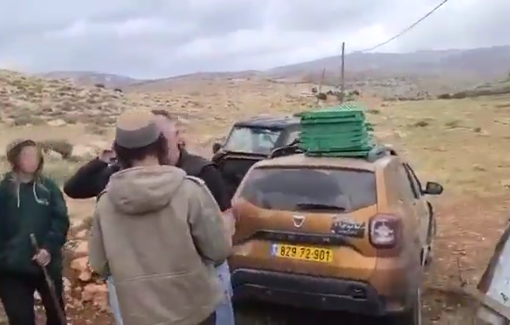 Thumbnail preview image for the video titled: Yedidya Kaufman leads teenagers in assaulting activists in Khirbet al-Tuwail