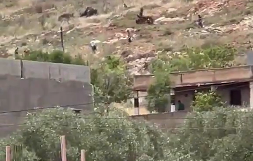 Thumbnail preview image for the video titled: Israeli settlers, accompanied by a military bulldozer, storm the area surrounding homes in the Khirbet Sarra Plain