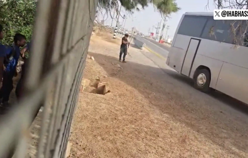 Thumbnail preview image for the video titled: An Israeli settler intimidating children on their way to school at the entrance of Taybeh