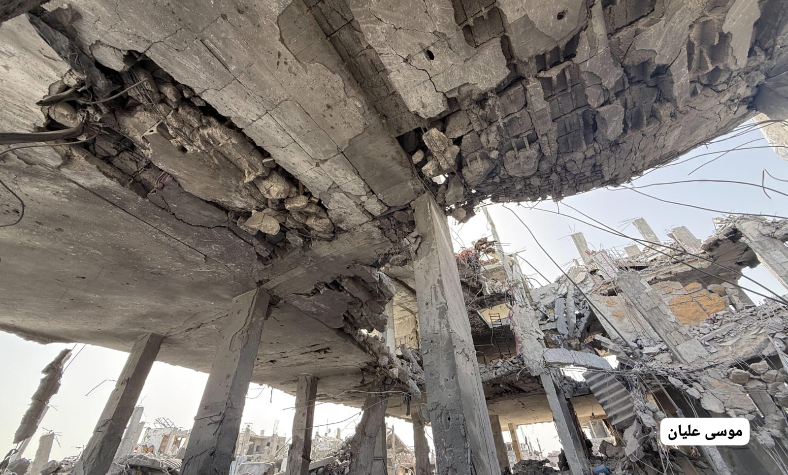 Thumbnail preview image for the video titled: Residential block destroyed by Israeli bombing of Al-Faluja area