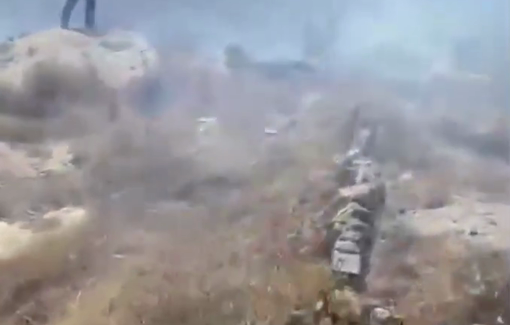 Thumbnail preview image for the video titled: Israeli settlers set fire to Palestinian agricultural land in Fuqeisis, near Dura