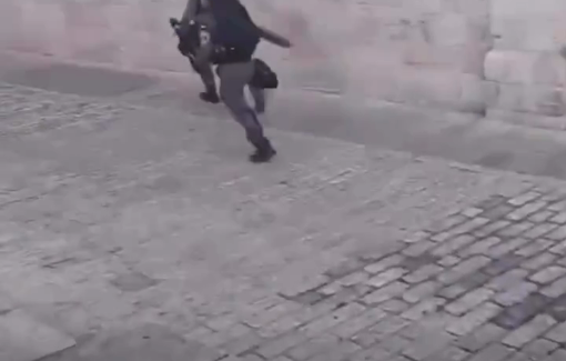Thumbnail preview image for the video titled: Israeli police gang-assault and remove the hijab of a Muslim woman at Al-Aqsa during Eid prayer