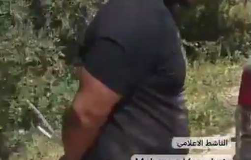 Thumbnail preview image for the video titled: Army-backed Israeli settlers attacked Palestinian farmers in the town of Beit Ula