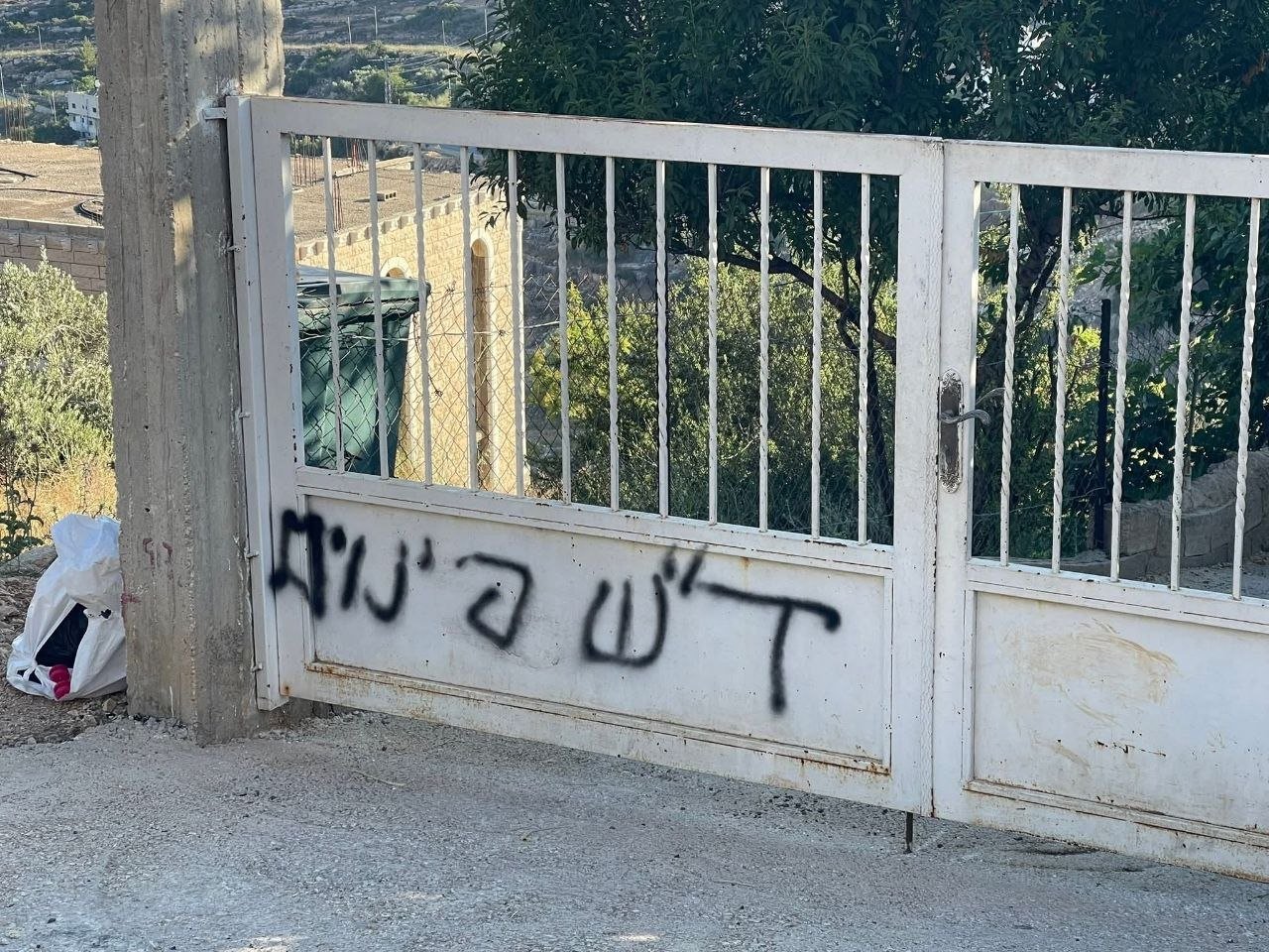 Thumbnail preview image for the video titled: Israeli settlers carried out a pogrom on Umm Safa, spray-painting racist anti-Arab slogans